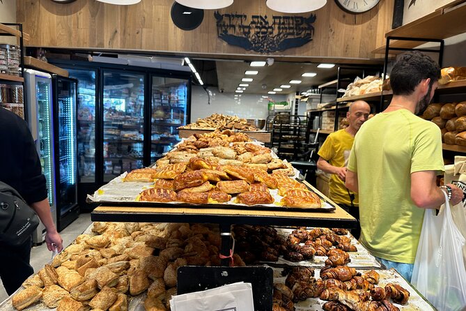 Tel Aviv: Carmel Market Food Tasting Tour “Shuk Hacarmel” - Falafel, hummus, olives, and sabich