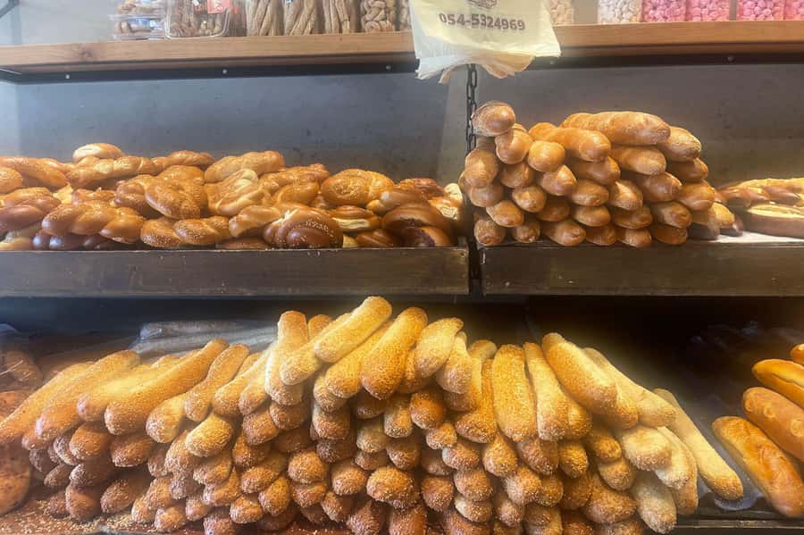 Tel Aviv: Carmel Market & Neighborhood Guided Walking Tour - The pace, walking distance, and physical demands