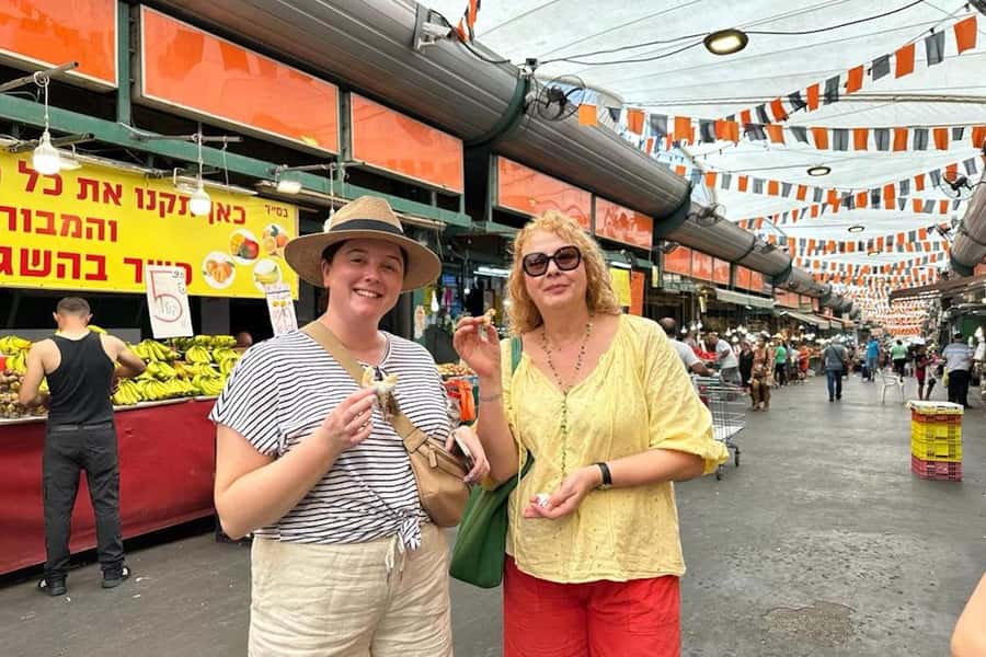 Tel Aviv: Food Tasting Tour of Iraqi Jewish Tikva Market - Shawarma with hummus, tahini, and salad